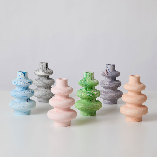 A selection of jesmonite bump vases in various colours