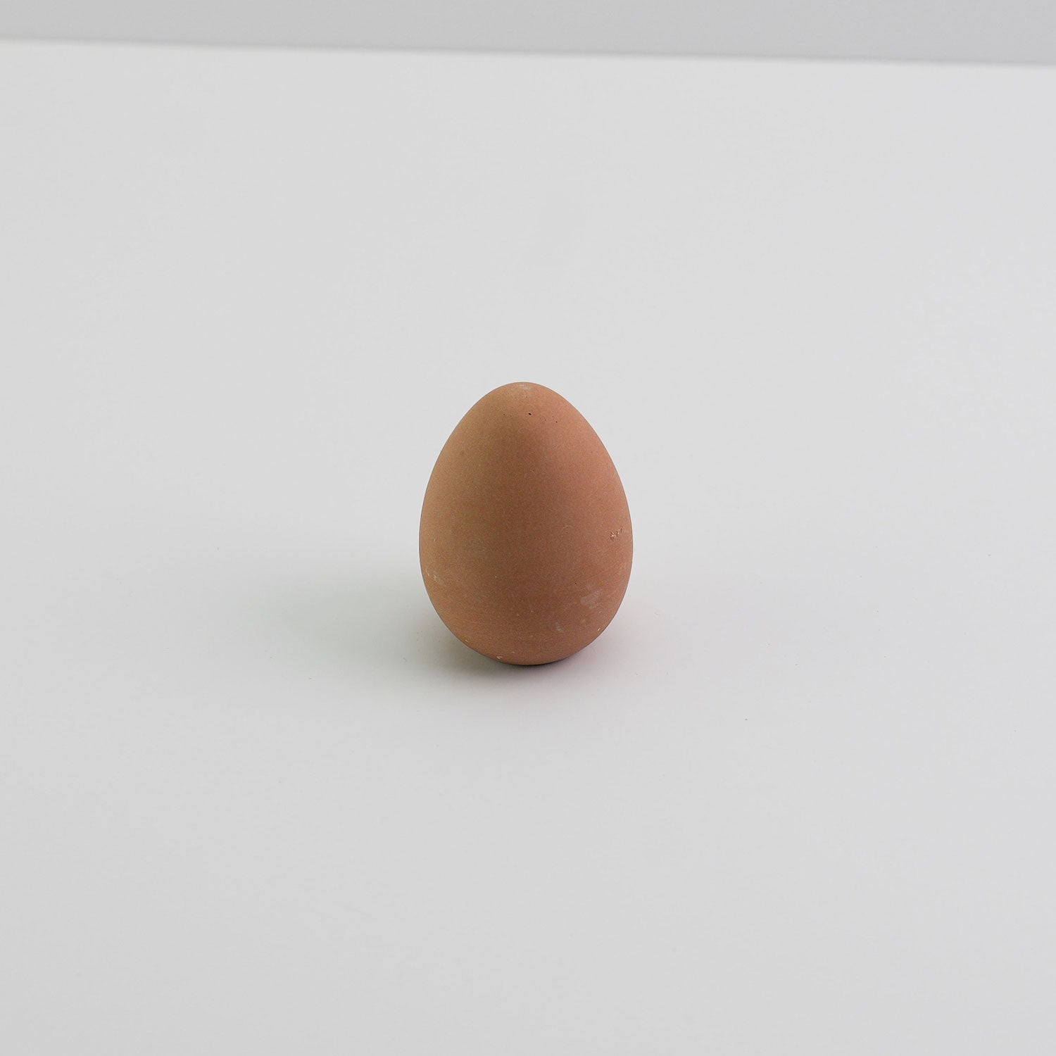 Jesmonite decorative egg in brown