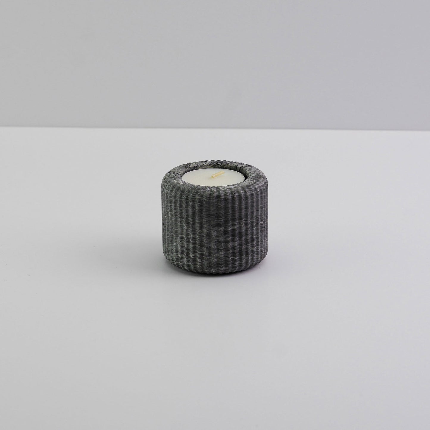 Jesmonite ridged tea light holder in black