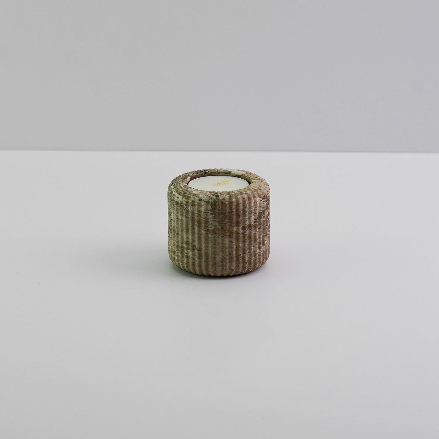 Jesmonite ridged tea light holder in brown