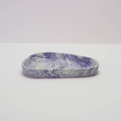 A jesmonite trinket tray in purple